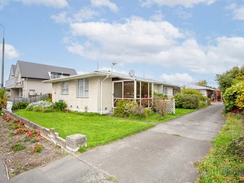 Sharp Price, Ideal Location! Add Some TLC