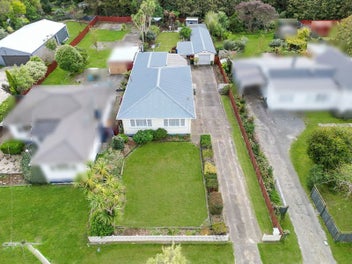 Solid & spacious with garaging to boot!