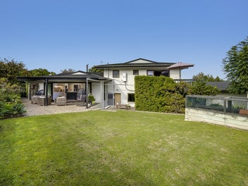 Tastefully Renovated with Triple Car Garaging!