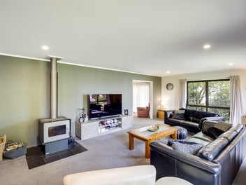 Tastefully Renovated with Triple Car Garaging!