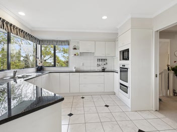 Prime Location with Triple Garage & Sea Views