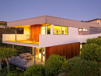 Designer Hillside Retreat with Sea Views