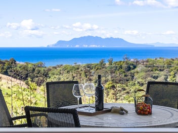 Sea Views, Four Car Garaging and Internal Lift