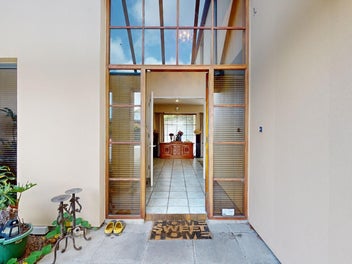 Attractive house on large section in good area.