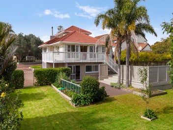 Huge home and flat with development potential!