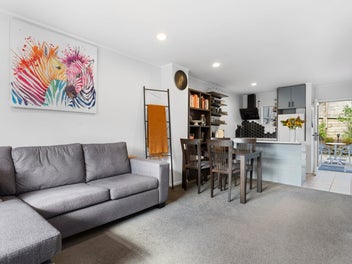 RENOVATED TWO-LEVEL UNIT. PRIVATE YARD, OWN GARAGE