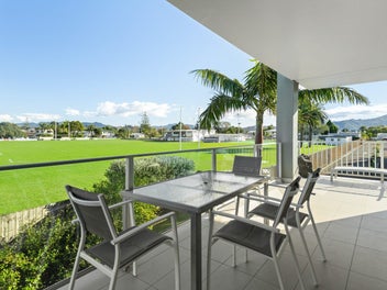 Two level apartment with grandstand views