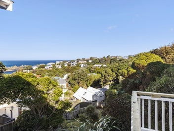 CHARACTER HOME WITH VIEWS AND LAND.