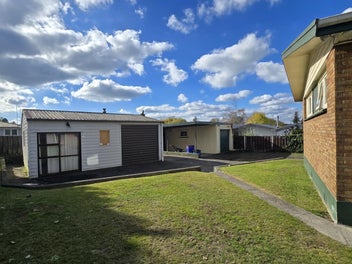 Four Bedrooms, Three Levels, Three Garages
