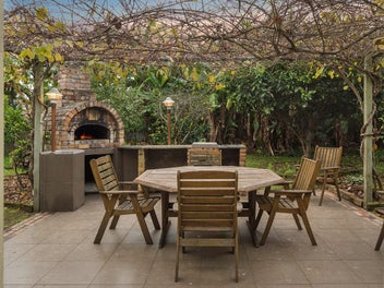 Solar-Powered, Garden-Fed, and Charming