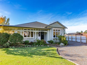 Stunning Character Home with Exceptional Garaging