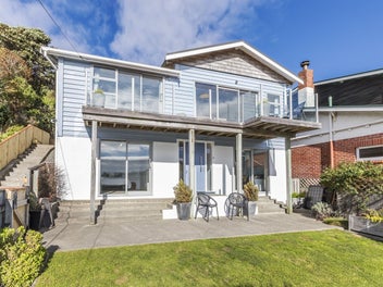 RENOVATED, ELEVATED, SUNFILLED & GORGEOUS