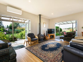 A Coastal Off-Grid Oasis - On 2 Titles!