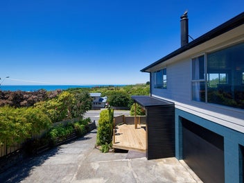 Sunny Coastal Home with Sea & Mountain Views