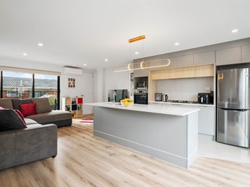 Stylish Three-Level Townhouse in a Prime Location
