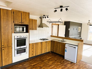 Sunny first home or investment with potential