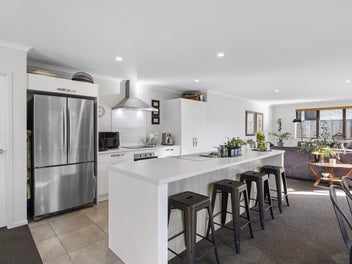 Enticing Entertainer with Timeless Style