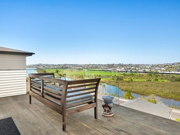 Riverfront Elegance with Sea Views