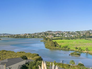 Riverfront Elegance with Sea Views