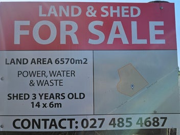 Prime one and half acre section and large shed