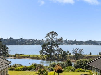 Car Enthusiasts Dream with Water Views