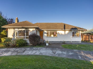 "TWO OPEN PLAN HOMES IN ONE"