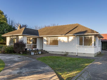 "TWO OPEN PLAN HOMES IN ONE"