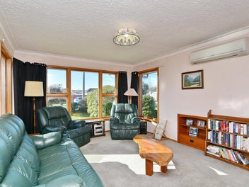 Great Starter With Huge, Four Car Garaging!