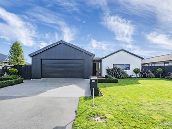 Spacious and Stylish with a Generous Back Yard