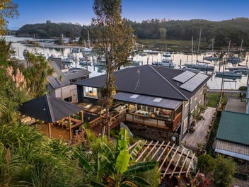 LUXURY WATERFRONT HOME & INCOME