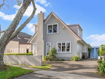 Modern Coastal Living with Timeless Charm & Views