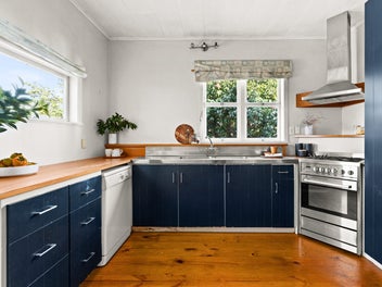 Solid Stucco Home with Plenty of Possibilities