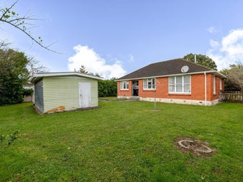 SOLID BRICK HOME WITH POTENTIAL