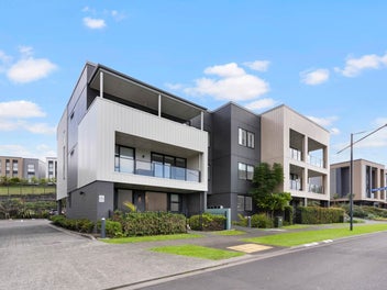 Rare Ground-Floor Apartment, Water Views & Parking