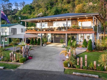 LUXURY WATERFRONT HOME & INCOME