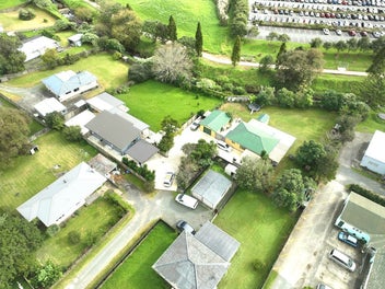 INVESTMENT GOLDMINE - TWO HOMES, ONE PRIME TITLE!