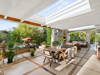Solid home, 8 car garaging - You can afford it!
