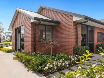 Brick Elegance Meets Country Living