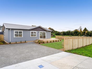 STYLISH, BRAND NEW HOME IN PRIME CORNER LOCATION