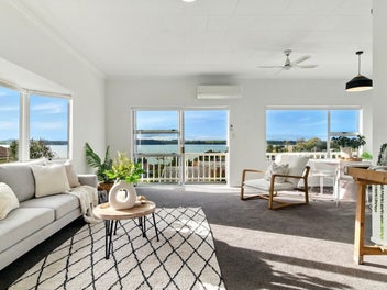 Stylish, Sea-View Living. Move-In Ready!