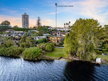 Impeccably Maintained Lake Frontage Home