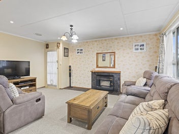 Solid Stucco, Huge Garage & Endless Potential