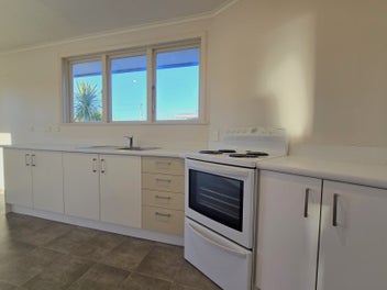 Excellent location - solid home with garaging