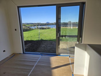 Family Living in Te Awanui Waters, Omokoroa