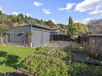 Four-Car Garaging, Views & So Much More!