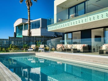 Absolute waterfront, lawn and pool!
