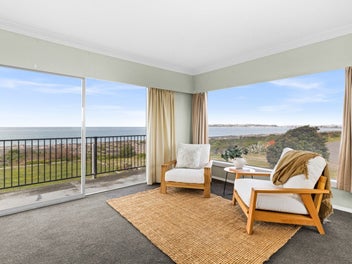 Beachfront Beauty with Endless Potential