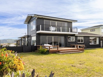 Beachfront Beauty with Endless Potential