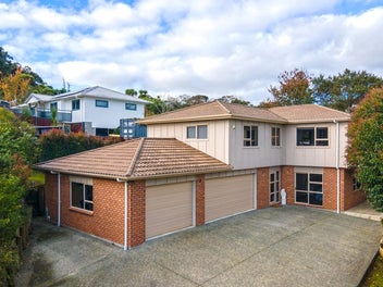 Three Car Garage with a Family Home!