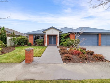 Triple Car Garaging - This home must be sold!